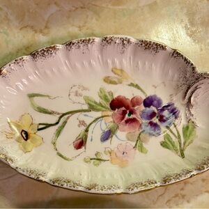 Hand-Painted Floral Porcelain Dish with Gold Trim 
Dimensions: 6” x 3.5”